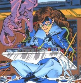 Shadowcat working on a computer with Lockeed helping